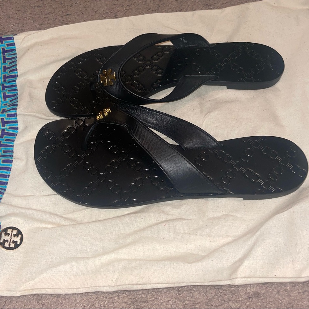 Size 6.5 brand new black Tory Burch sandals.